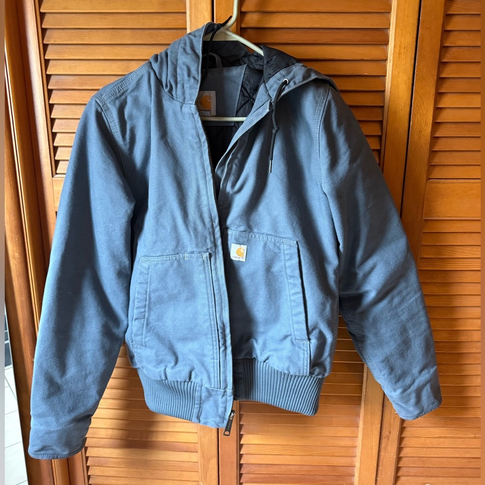 EXCELLENT condition Carhartt blue jacket- never worn. Too small.